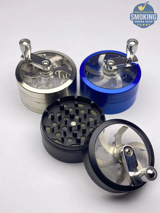 مطحنة تبغ معدنية مع ذراع تدوير — Tobacco Grinder with Crank Handle 🌿⚙️