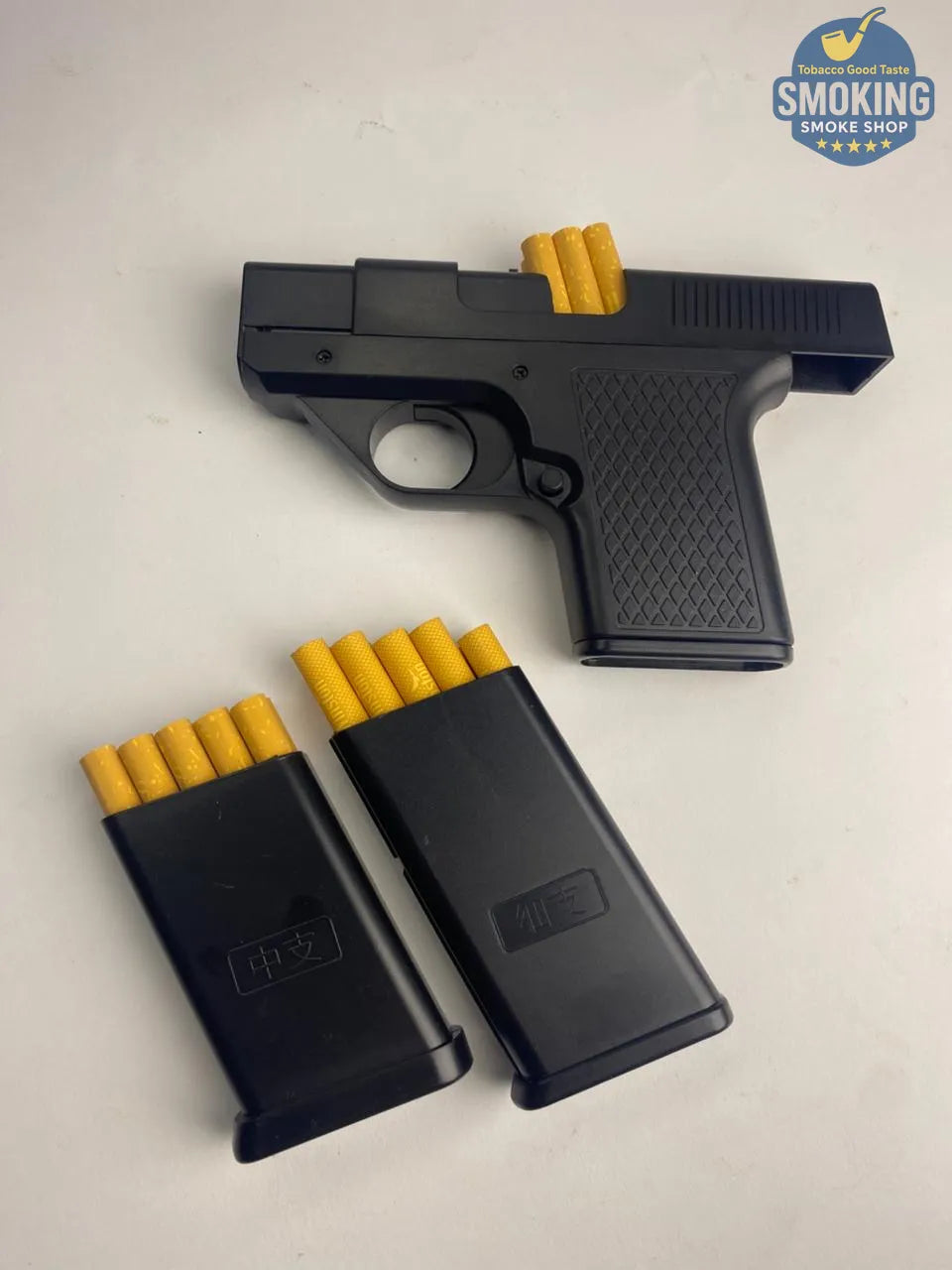 🔫 Gun-Style Cigarette Case with Laser Lighter — علبة سجائر مكتبية على شكل مسدس بولاعة ليزر مدمجة